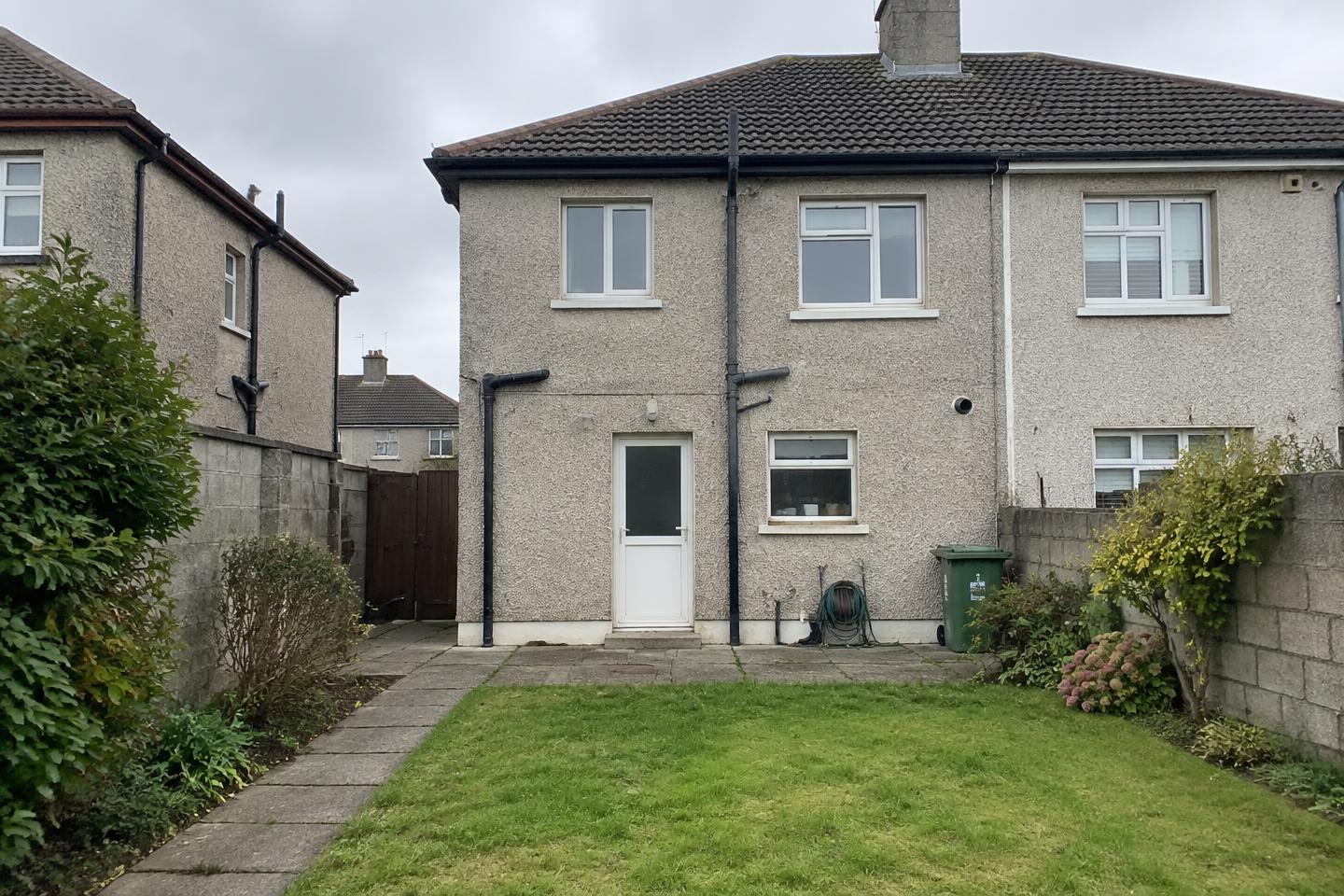 Dated, cramped rear of a suburban house before its extension